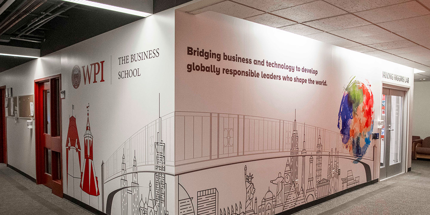 Mural of buildings from around the world with The WPI Business School logo