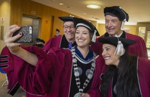 President Leshin has some selfie fun with David Schwaber, left, Warner Fletcher and Reshma Saujani.