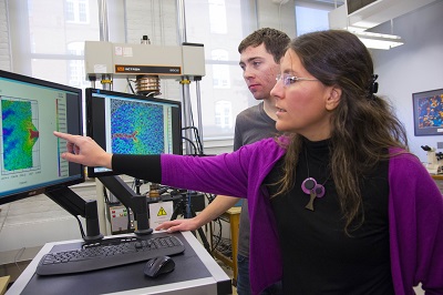 WPI professor Diana Lados analyzes test results on an aircraft aluminum alloy in Washburn labs. 