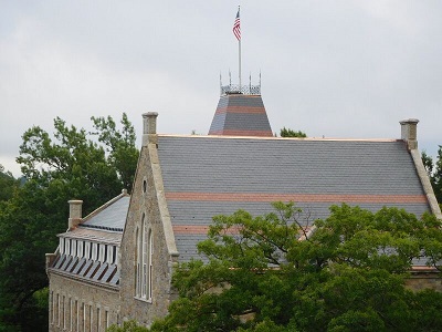 The restored slate roof on Boynton Hall, with its characteristic red banding.