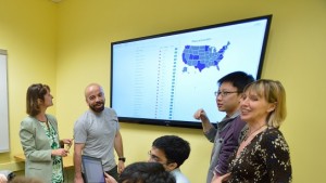 Students under the direction of Professor Elke Rundensteiner, right, developed a data analytics system that could help shape economic policy in Massachusetts.