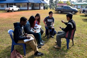 From left, WPI students and their Thai counterparts, Obi Ofokansi, Chalita, Caitlin Swalec and Napat, are interviewed by a member of the Mae La Oop River Basin Network.
