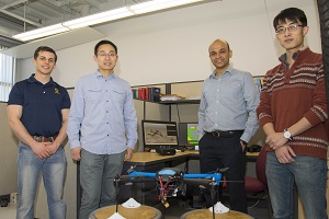 Professor Cowlagi (second from right) with graduate students Benjamin Cooper, Zetian Zhang, and Ruixiang Du