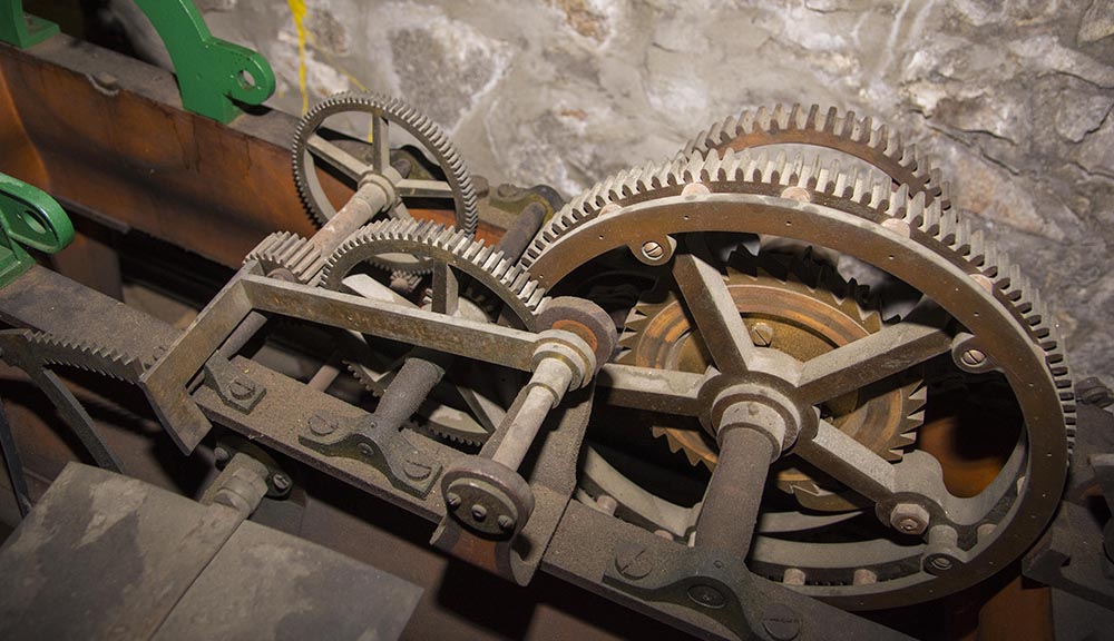 A close-up photo of some of the gears located in the Boynton Clock Tower.