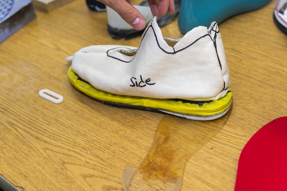 A WPI student team has created a prototype of a new shoe sole designed to protect athletes from ACL tears.