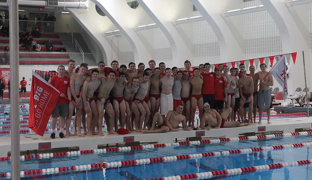 The Men's Swimming & Diving team gathers for a photo at the WPI pool.