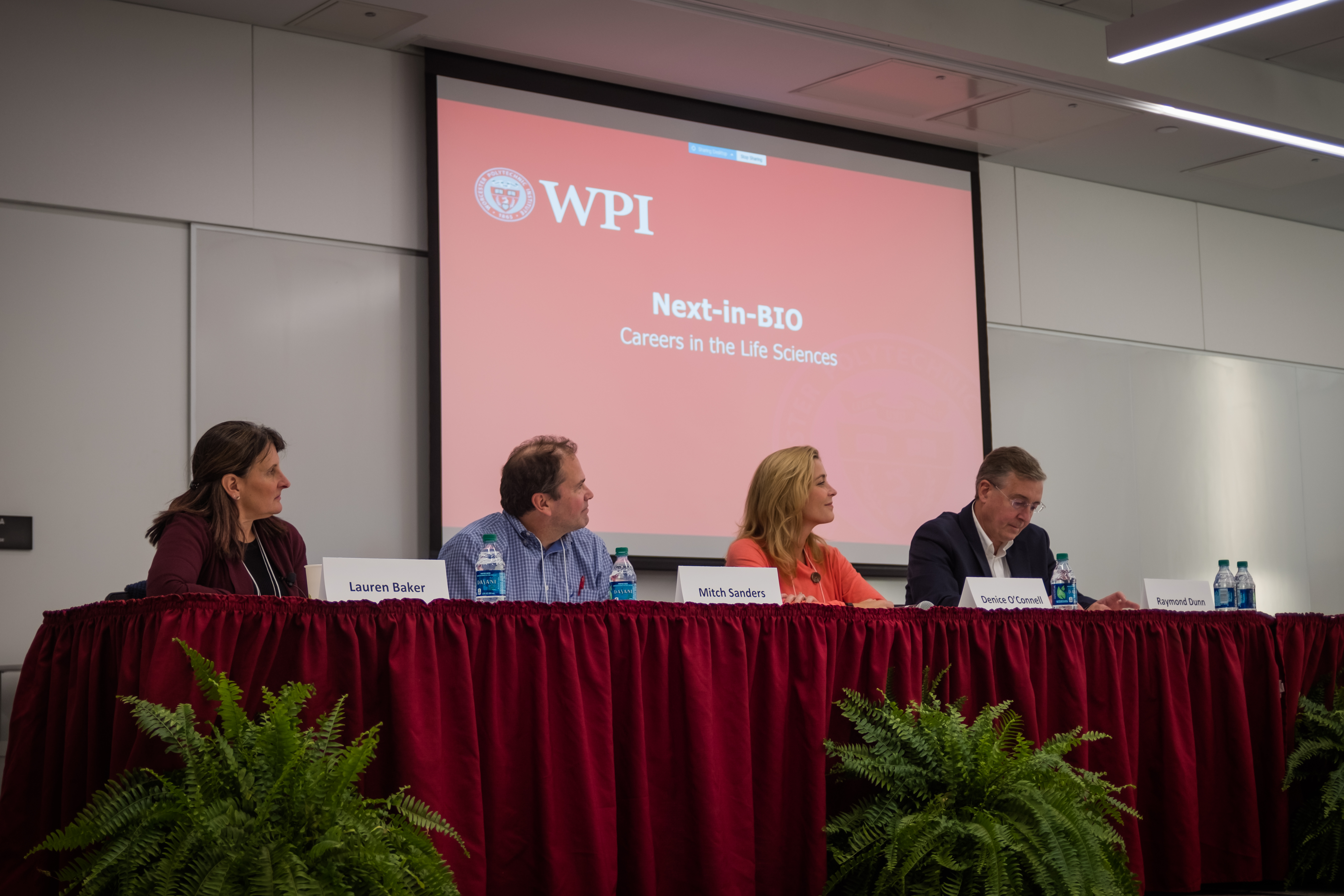 Members of the Next-in-Bio panel participate in a discussion.
