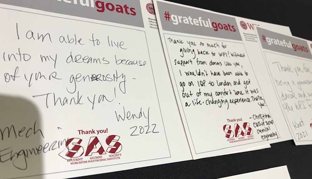 A close-up of two notes from students on #GratefulGoats stationery saying what makes them thankful for their WPI education.
