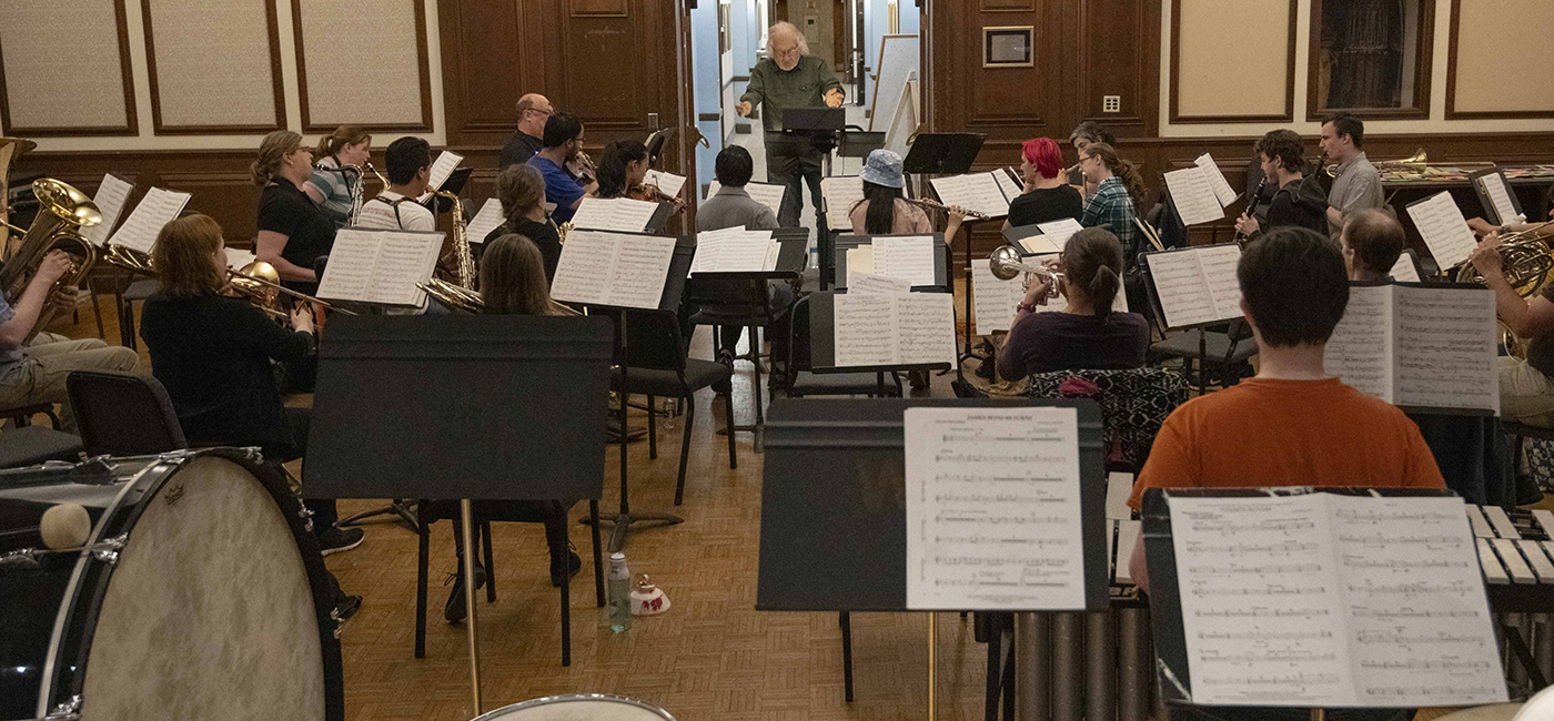 Summer Band performing in a music hall.