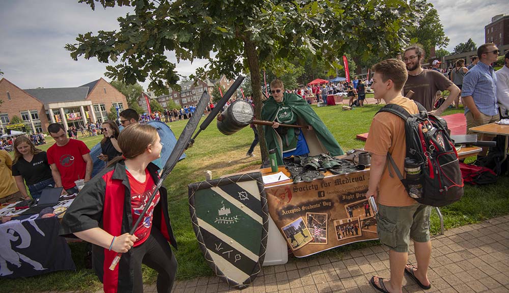 Students in the Society for Medieval Arts & Sciences share their boffer weapons and moves during the Student Activities Fair.
