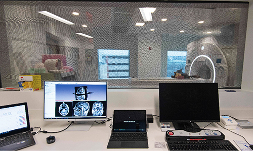 Neurotech Suite - Behind the scenes of a MRI room with computers