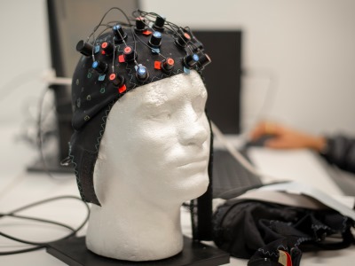 Manikin with a neuro cap on