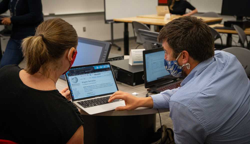 Members of the WPI community participate in a Wikipedia editing event in Gordon Library.