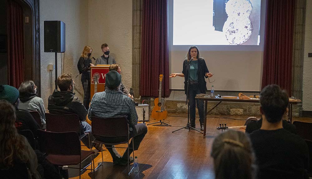 Rachel Rosenkrantz speaks to the audience during her Innovation in Guitar Making guest lecture.