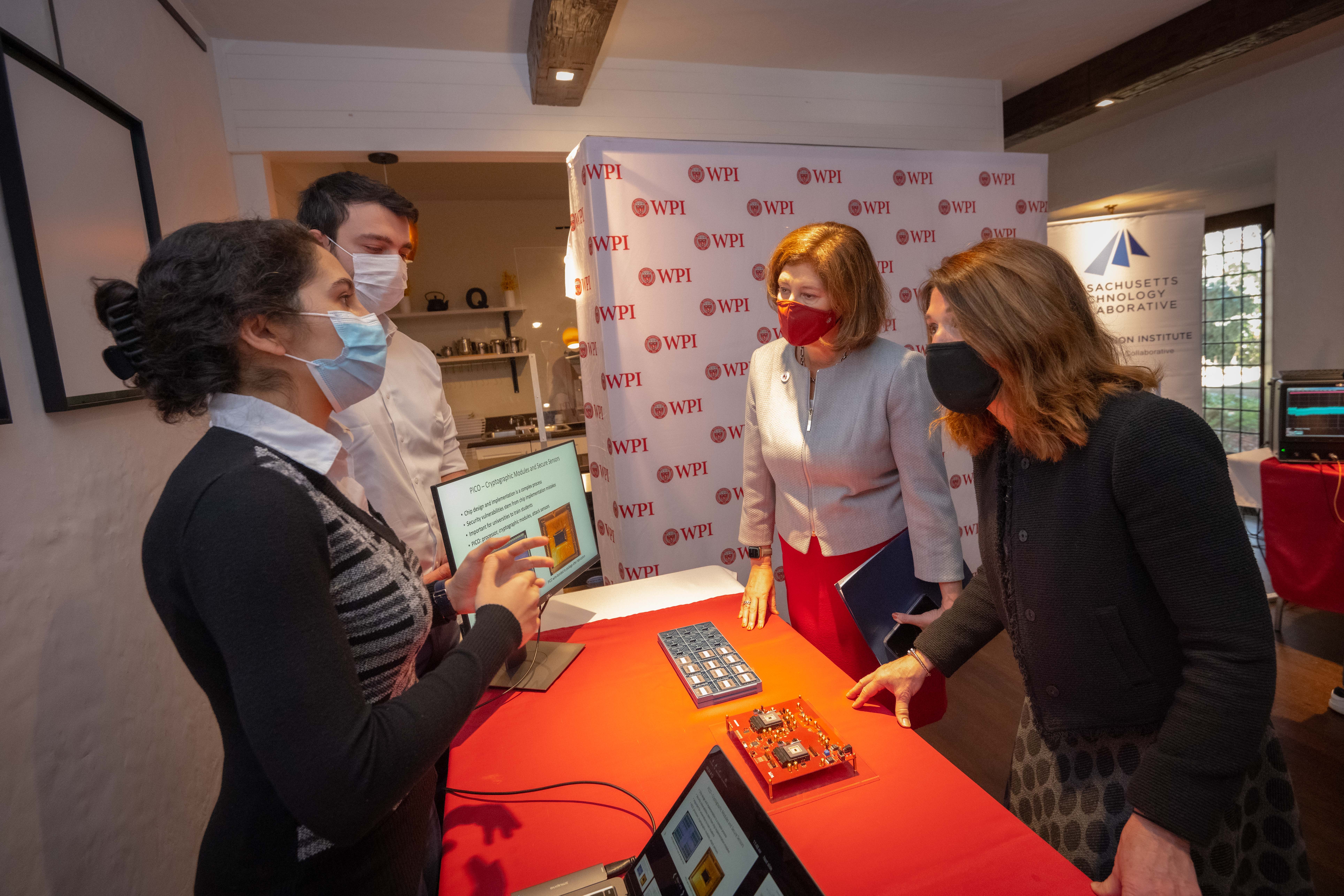 Students demo cybersecurity research for President Leshin and Lt. Gov. Polito  alt