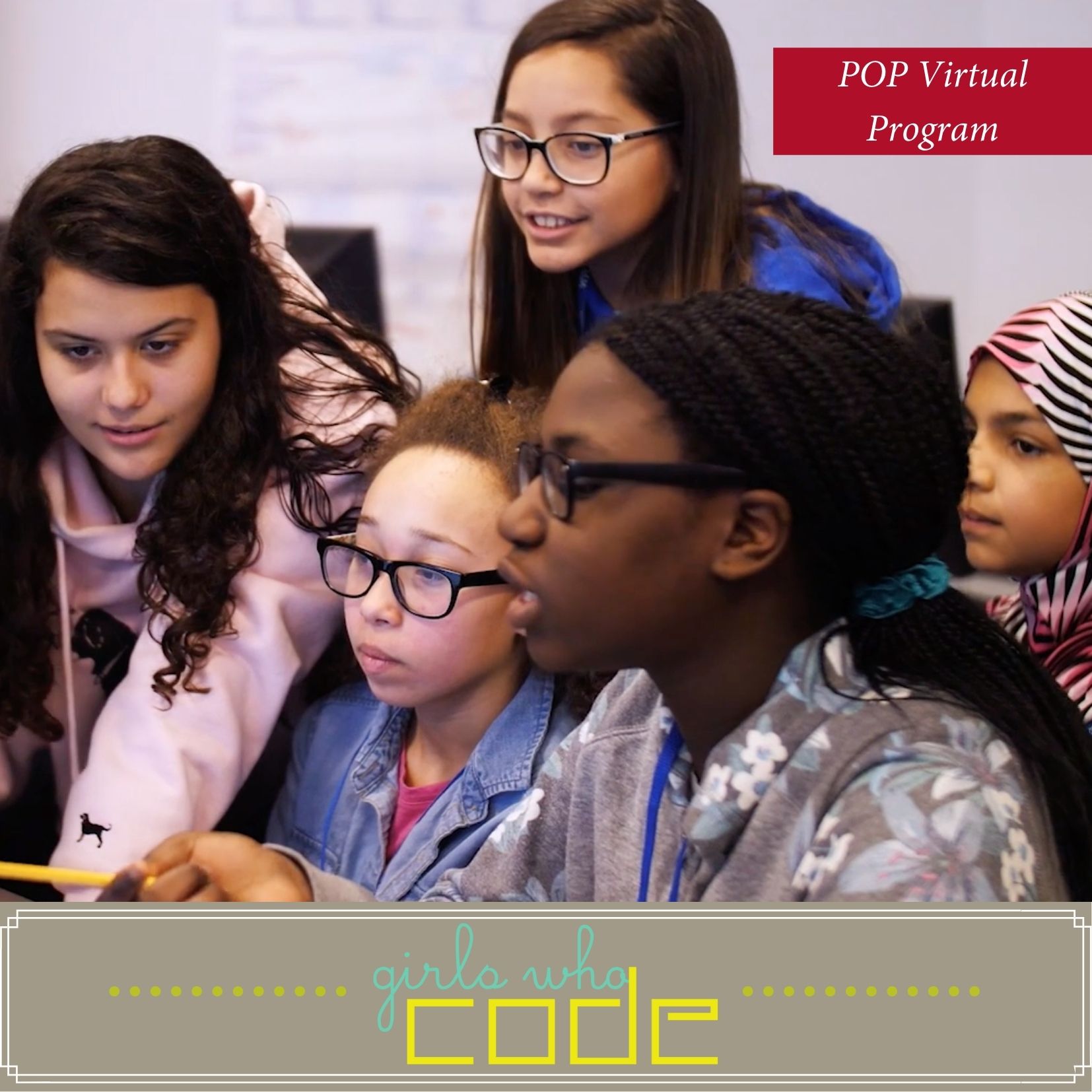 Girls learning coding at computer