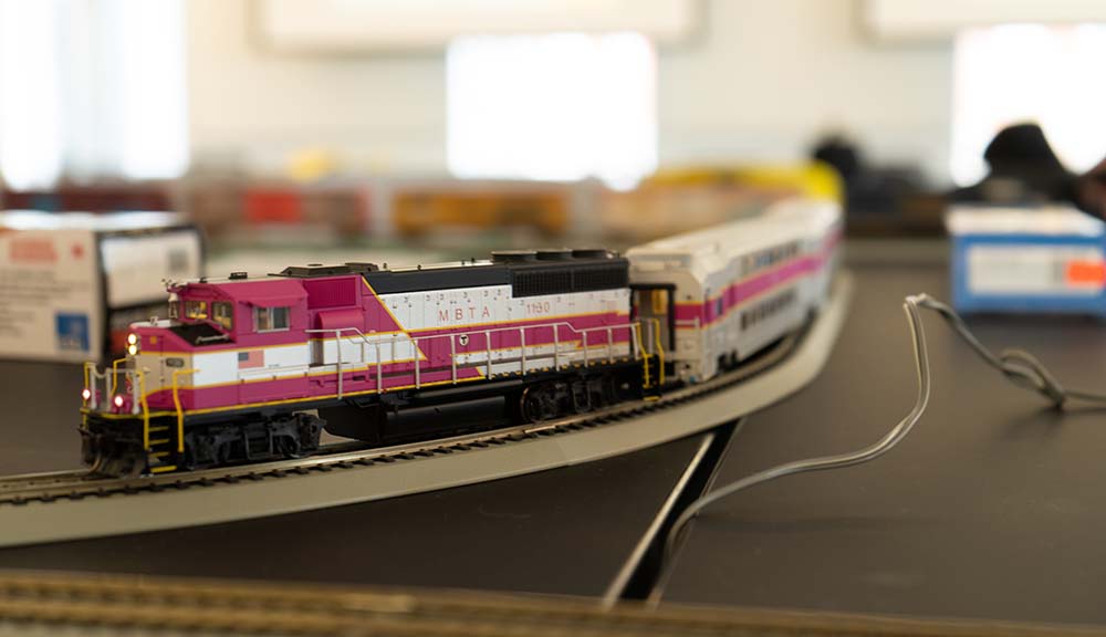 A close-up of the Model Railroading Club's model of the MBTA commuter rail.