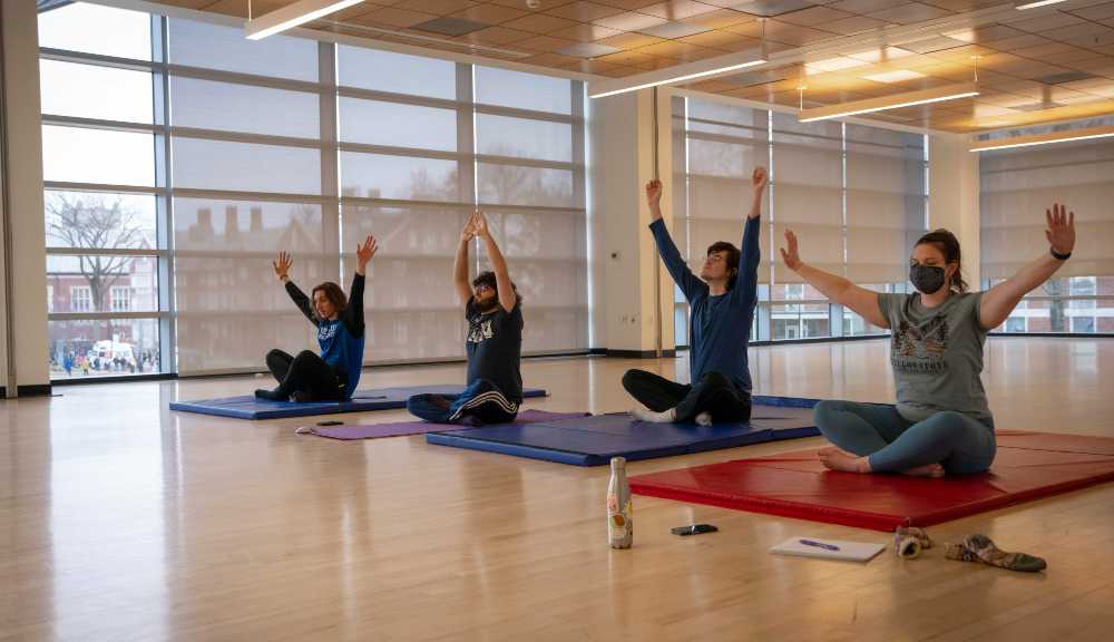 Students participate in a yoga session in the Sports & Recreation Center.