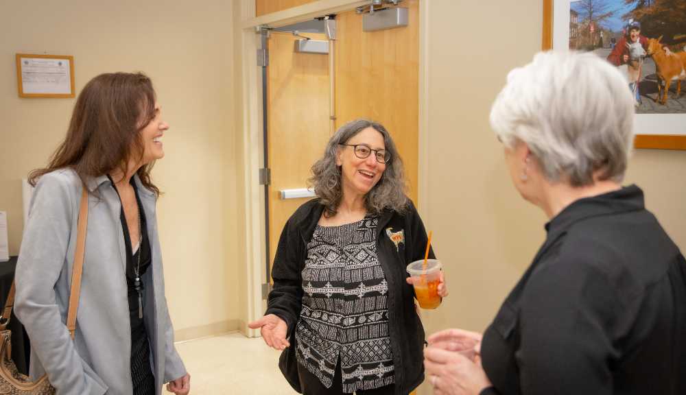 Retirees return to the Odeum and meet up with former coworkers.