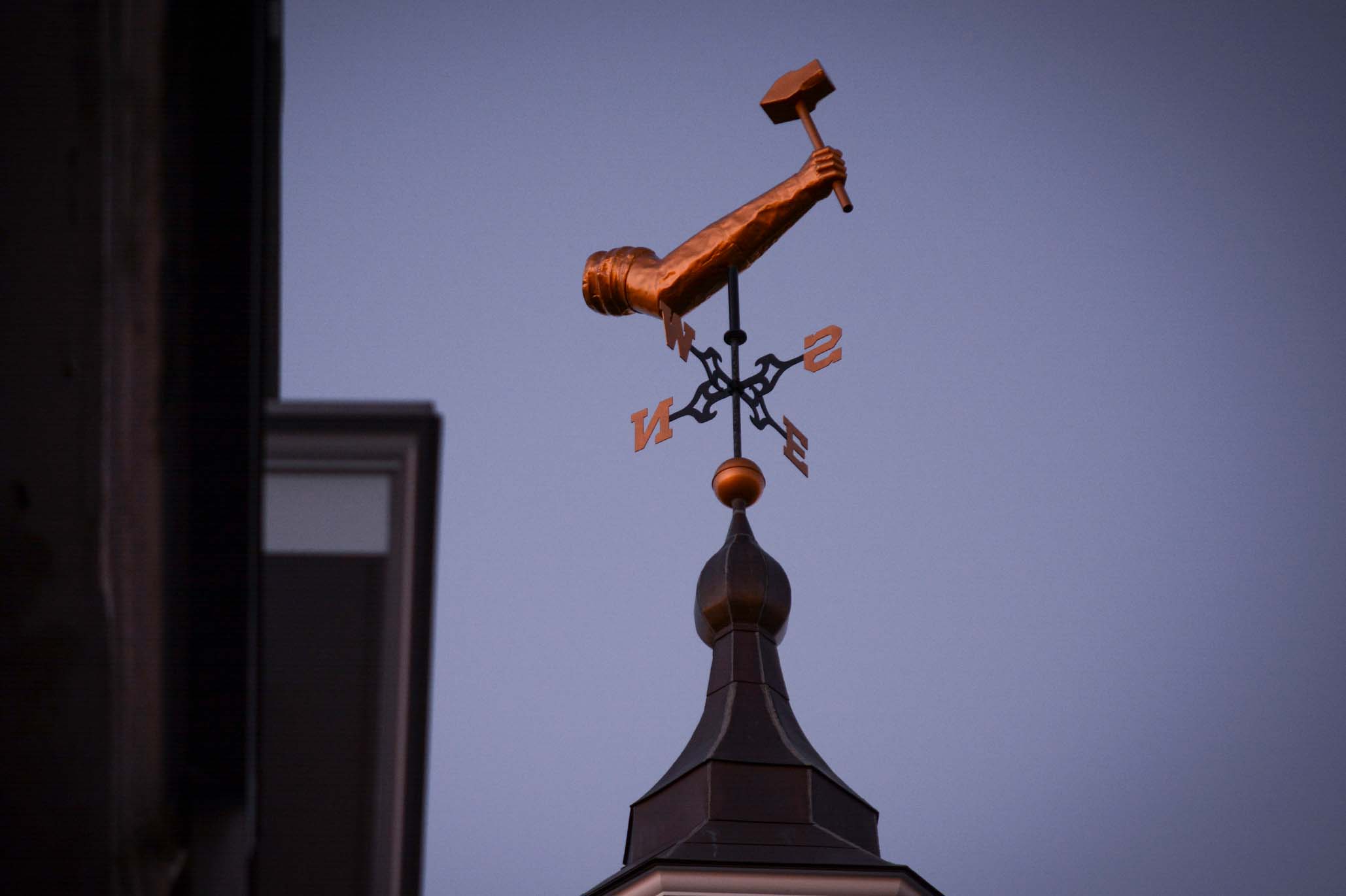 Arm sculpture of WPI logo on Building Top