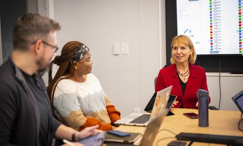 WPI Professor Elke Rundensteiner works with students on an NSF-funded project on fairness in artificial intelligence.