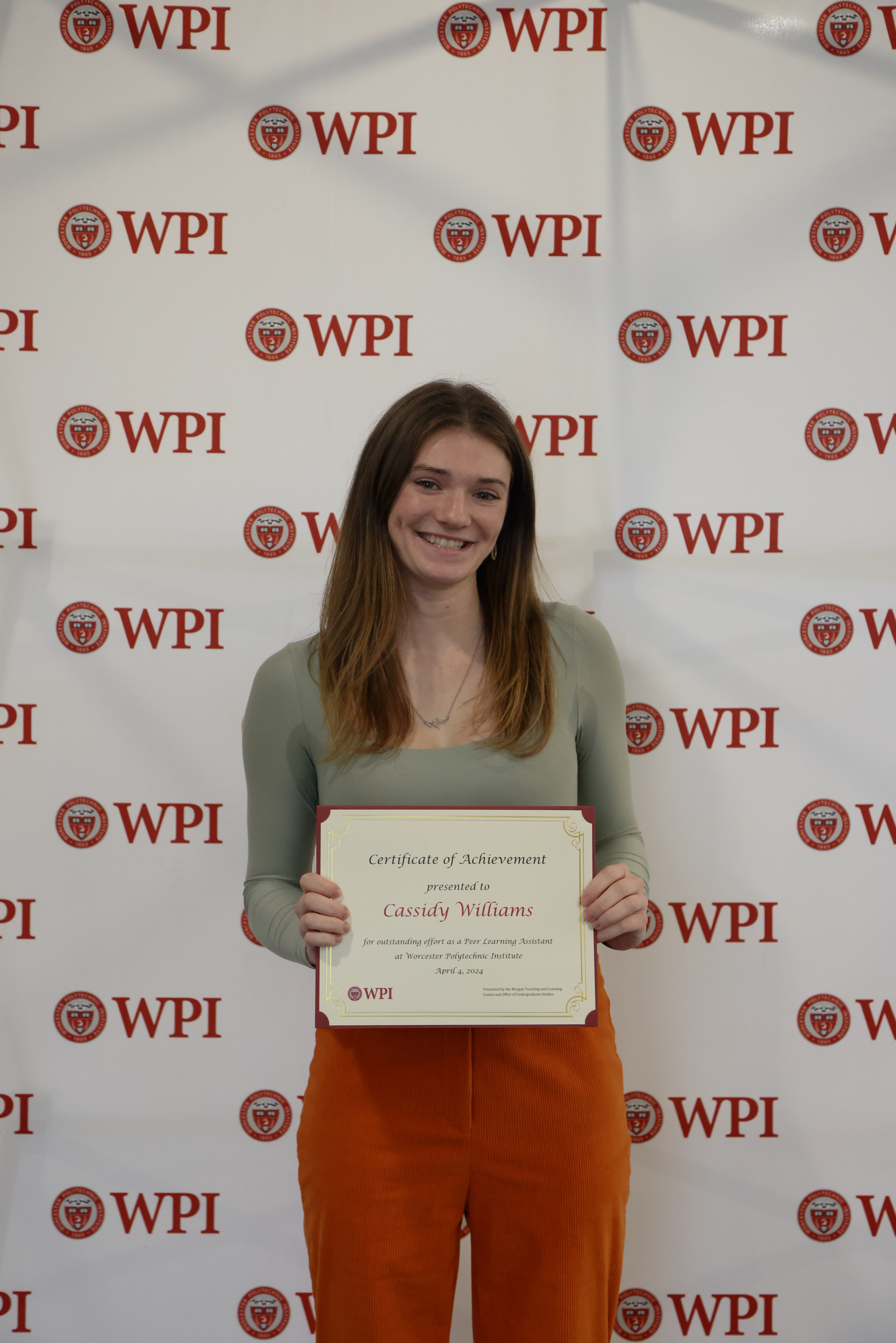 Cassidy Williams holding PLA Certificate of Achievment