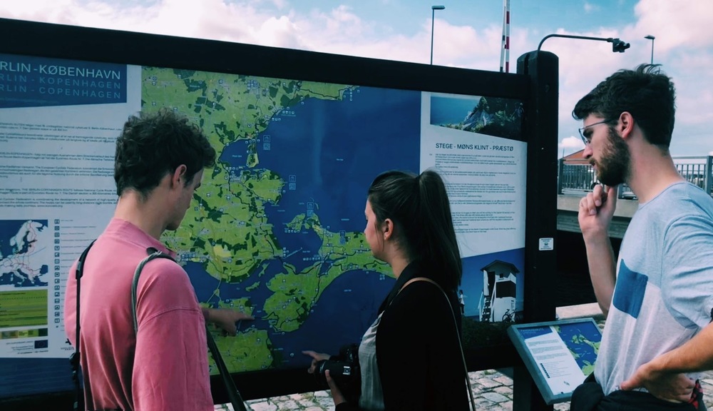 students studying map