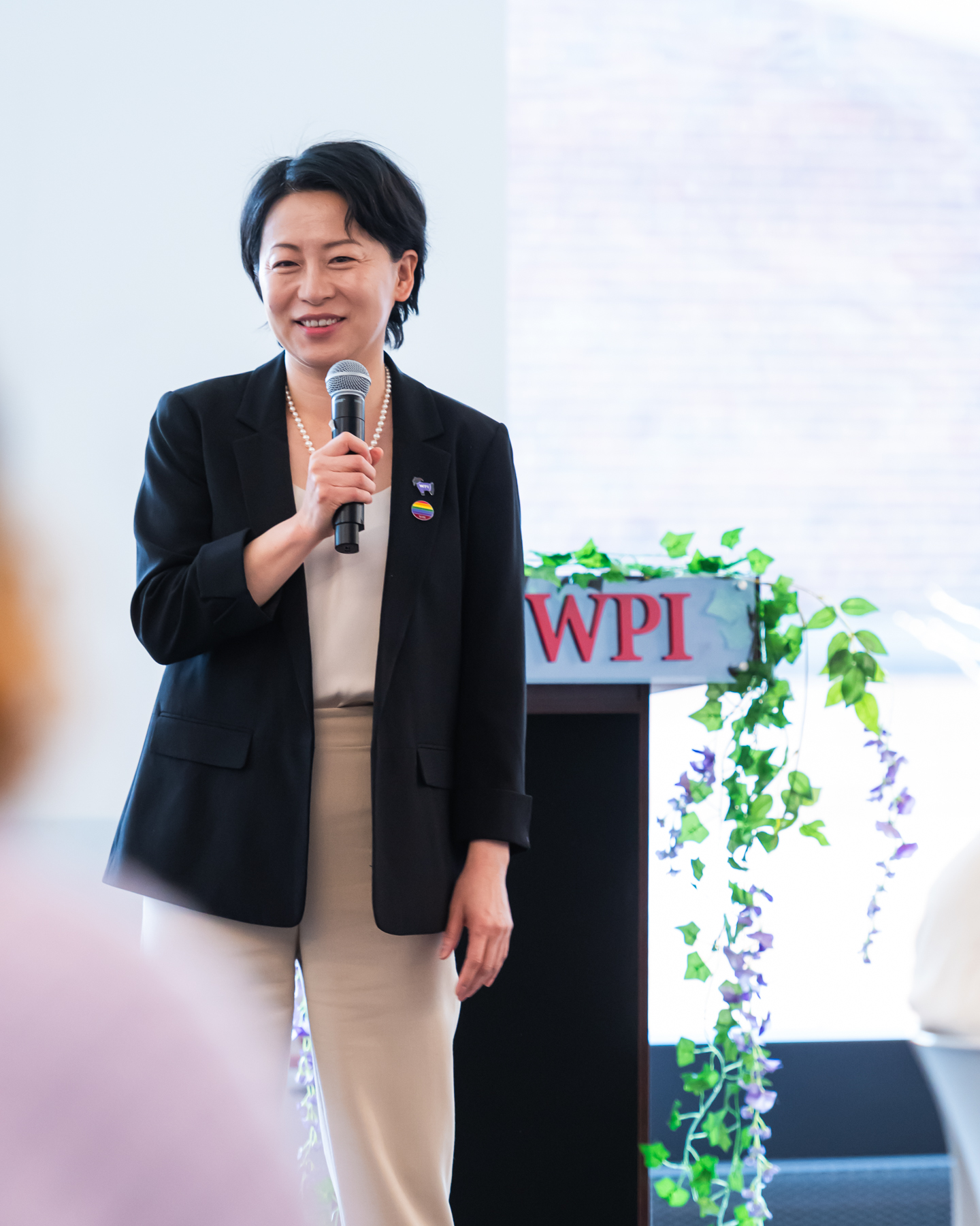 President Grace Wang speaking at Lavender Commencement 2024.