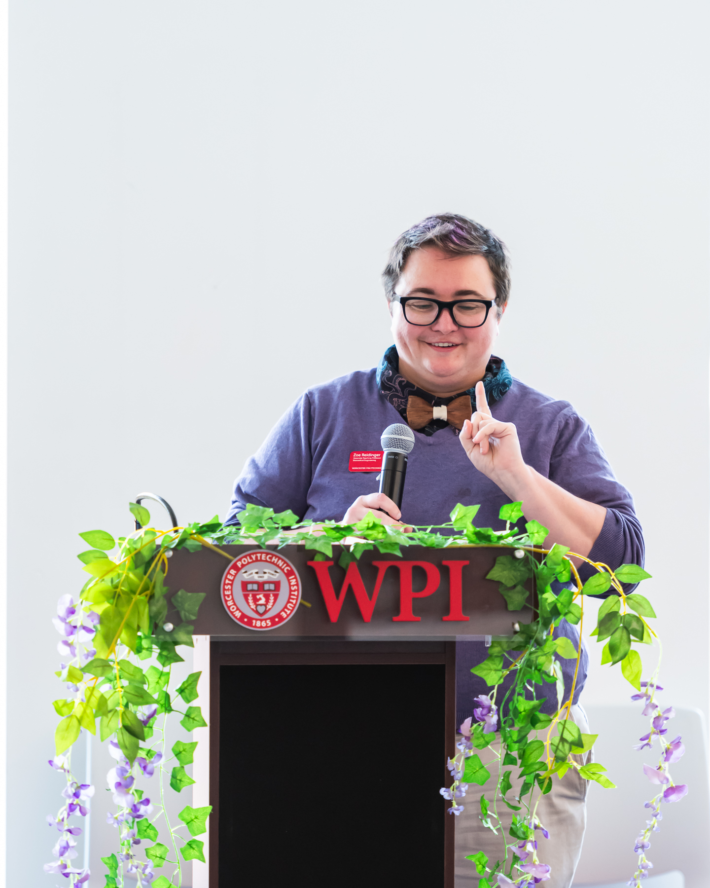 Professor Zoe Reidinger speaking at Lavender Commencement 2024.