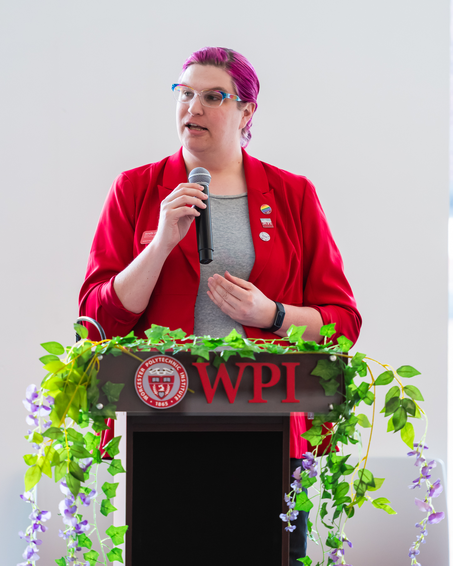 Janelle Drake '11 speaking at Lavender Commencement 2024.