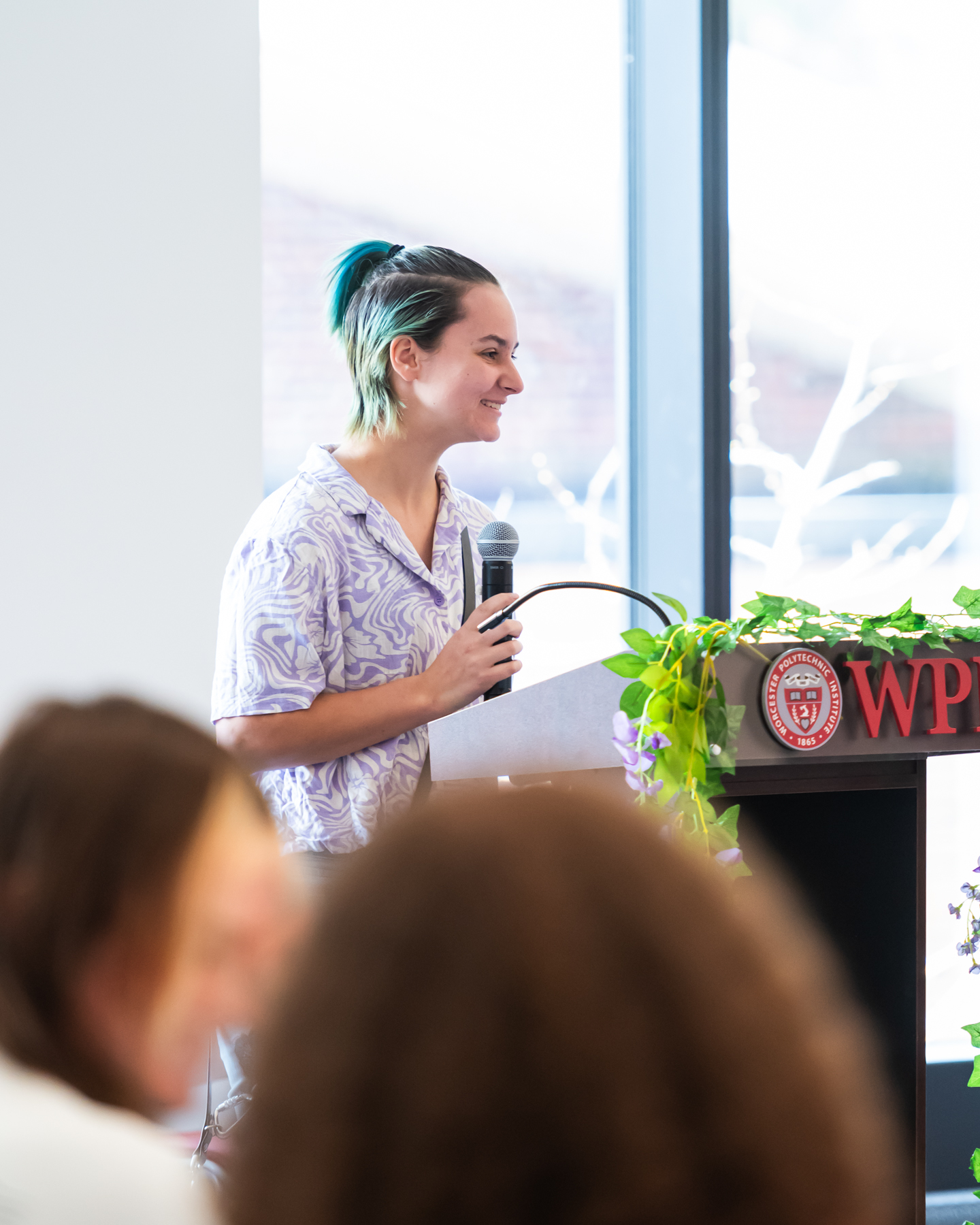 Quinn Sandberg '25, Vice President of the Alliance, speaking at Lavender Commencement 2024.