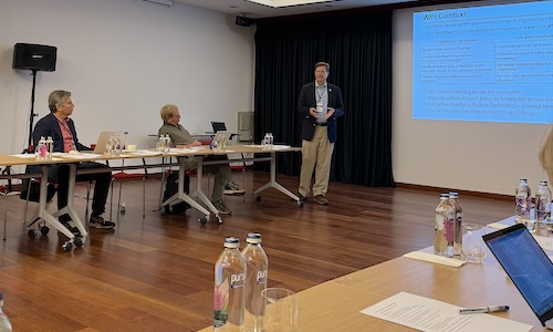 WPI Dean of Engineering John McNeill stands in front of fellow educators while presenting on project-based learning
