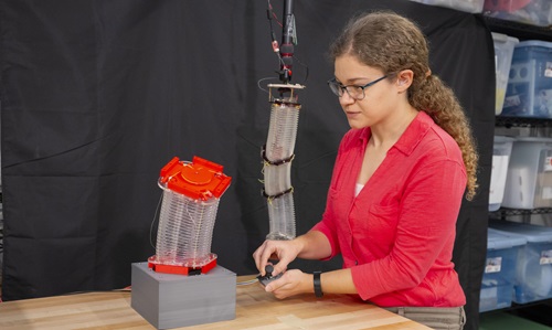 PhD student Gabrielle Conard conducts research on a soft robotic arm.