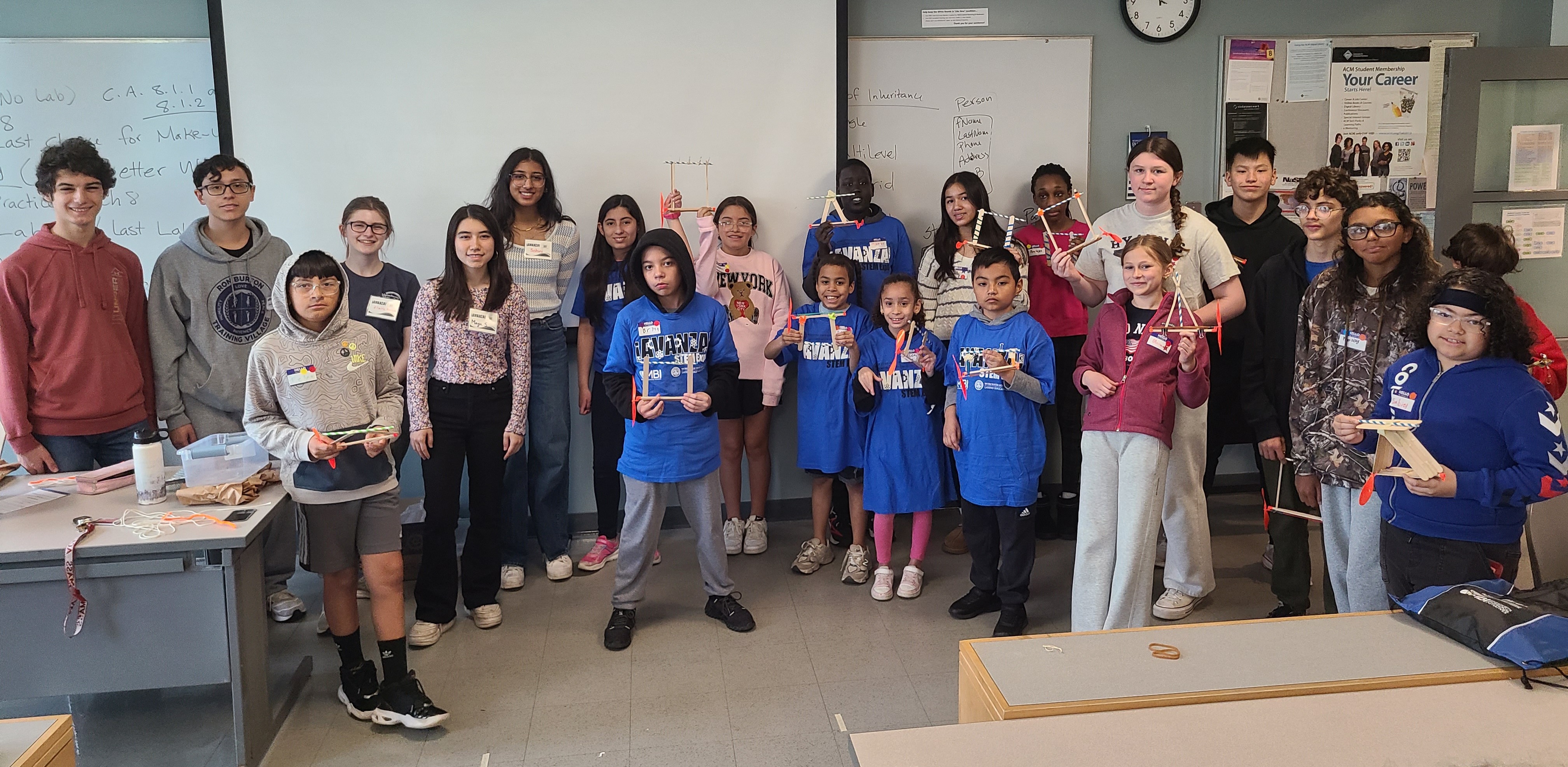 Middle and high school students showcase their zip line racers.  Activity facilitated by Mass Academy students.