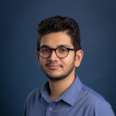 headshot of mitra anand