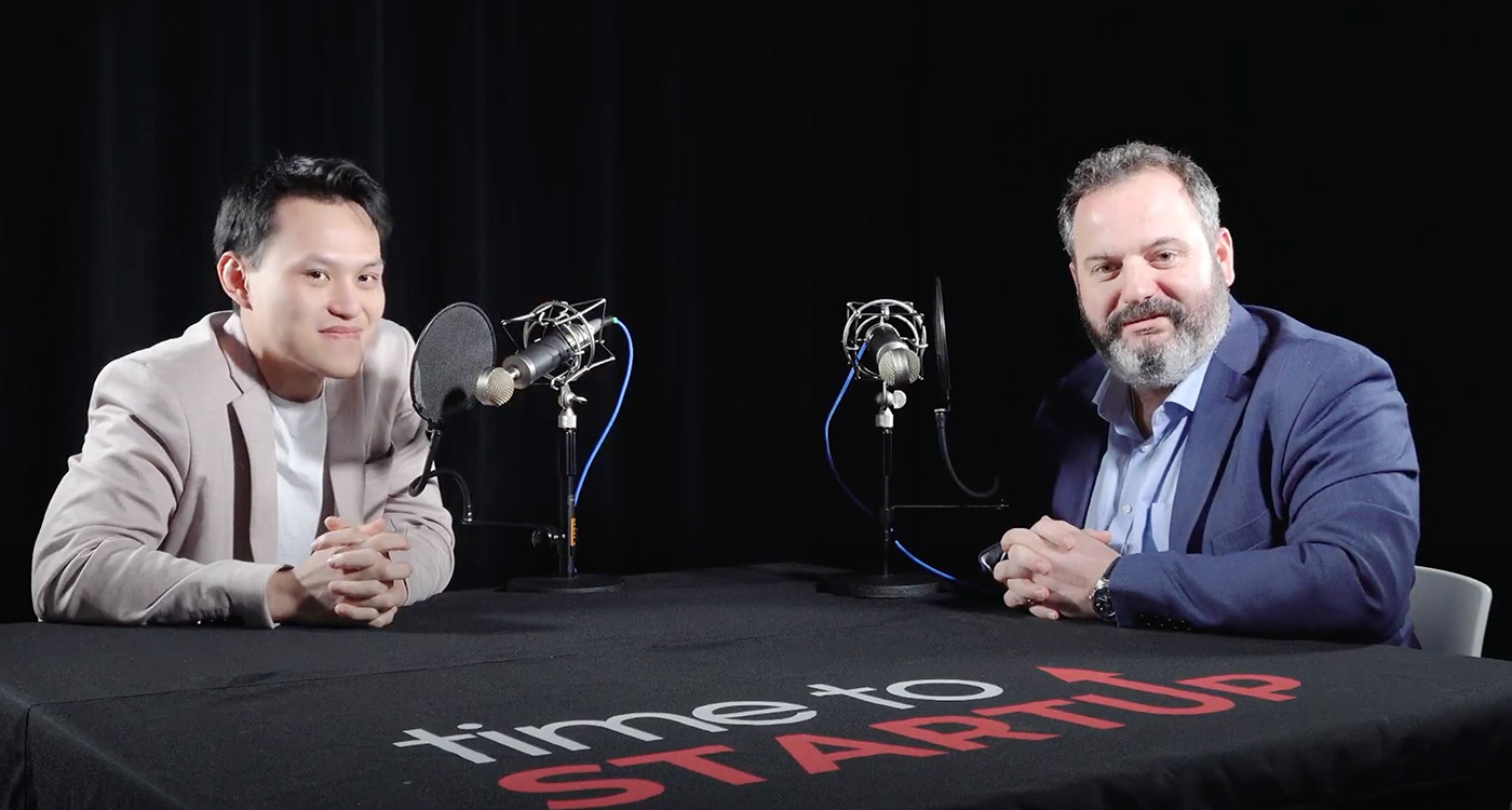 Two WPI podcast hosts recording an episode on the WPI Campus