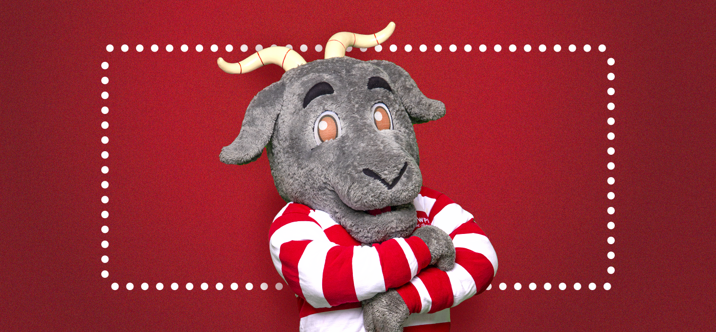 Graphic of WPI's Gompei mascot in front of a red background for Gompei's Guide