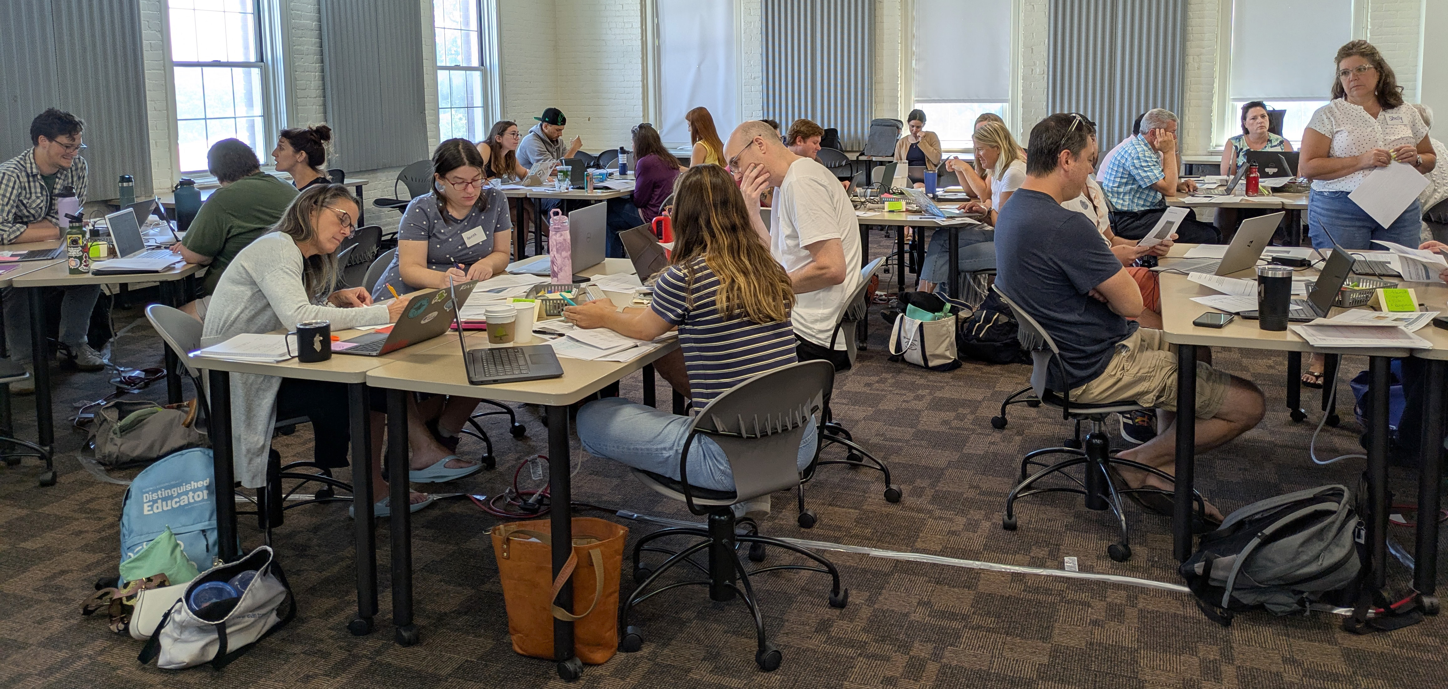 Educators collaborate in groups during the OpenSciEd High School Launch Training at WPI.