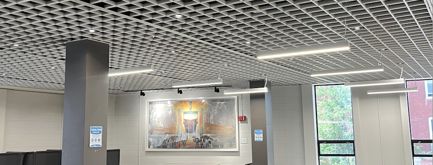 New lighting on the Gordon Library third floor shines on the &quot;Altar of Steel&quot; painting