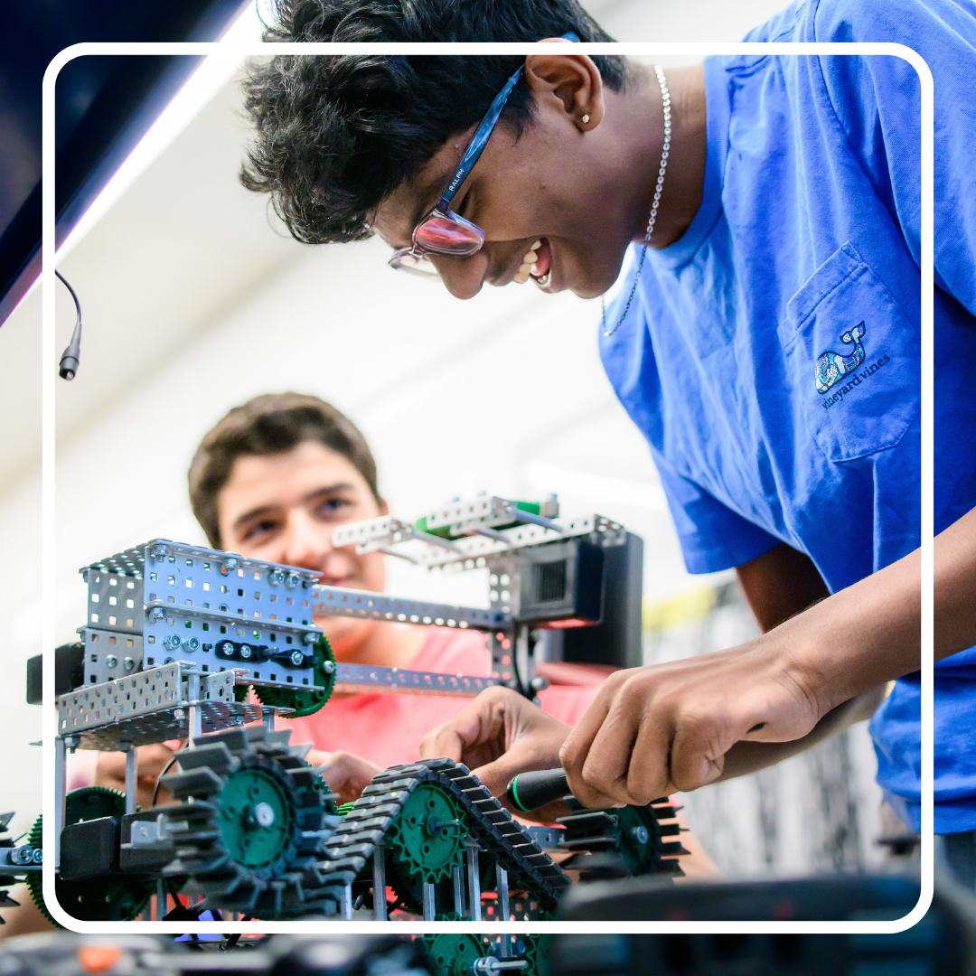 Male student working on a robot