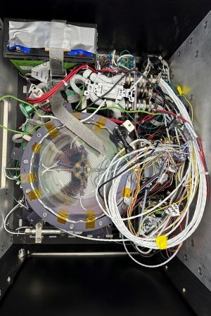 Equipment for an experiment is pictured before being loaded into a Blue Origin rocket.