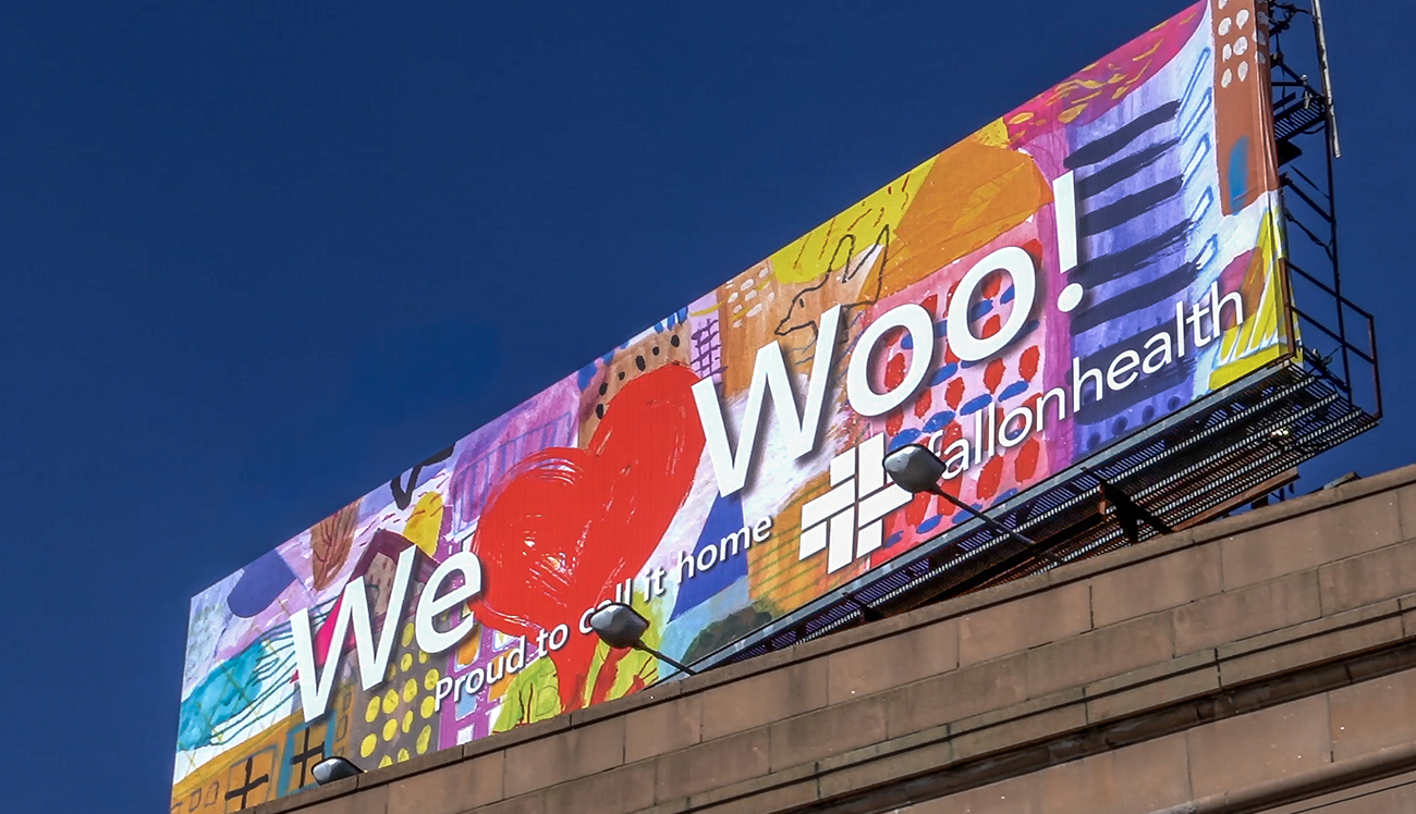 We Love Woo billboard sign