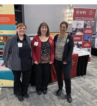 Liz Desrosiers, Donna Taylor, and Mia Dubosarsky at the WPI STEM Education Center exhibitor table during the MAST conference