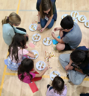 Campus Girl Scouts: Explore potato batteries and computer science through binary bracelet making