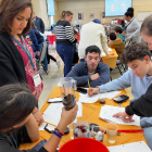 Participants take part in a team design challenge.