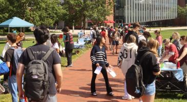 students at an event on the quad