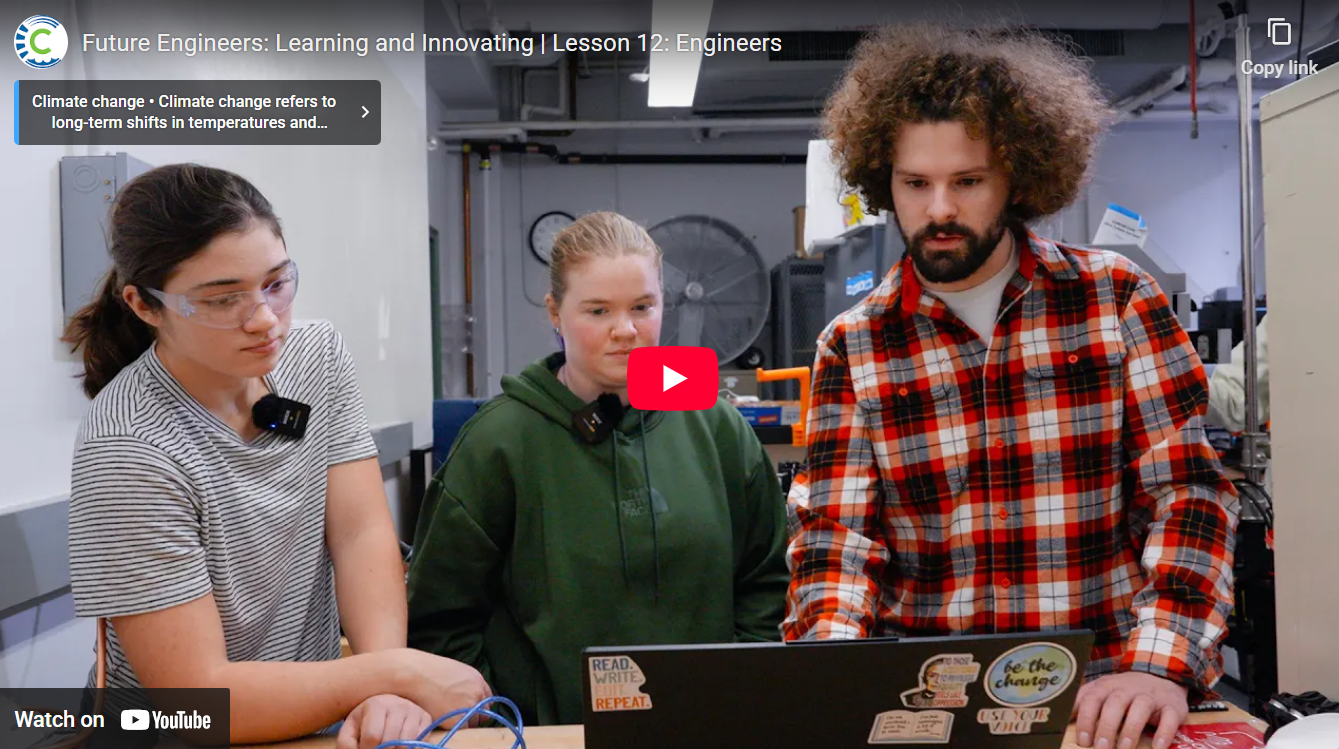 three students engaged in project work