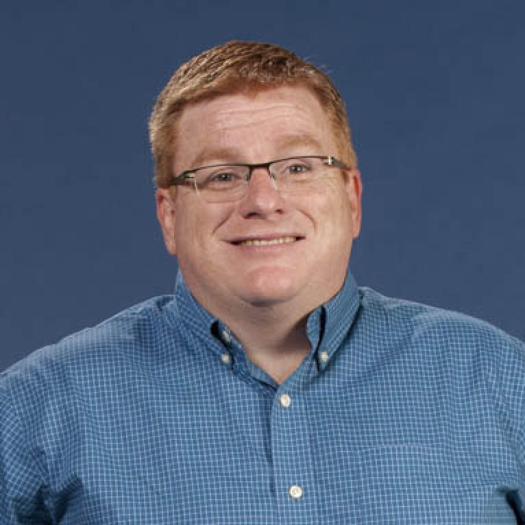 man in blue shirt