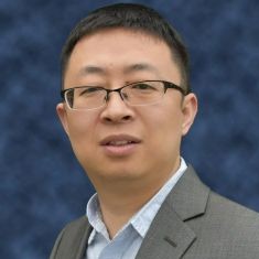 Man in glasses and business suit