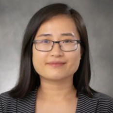 Woman in glasses and business suit